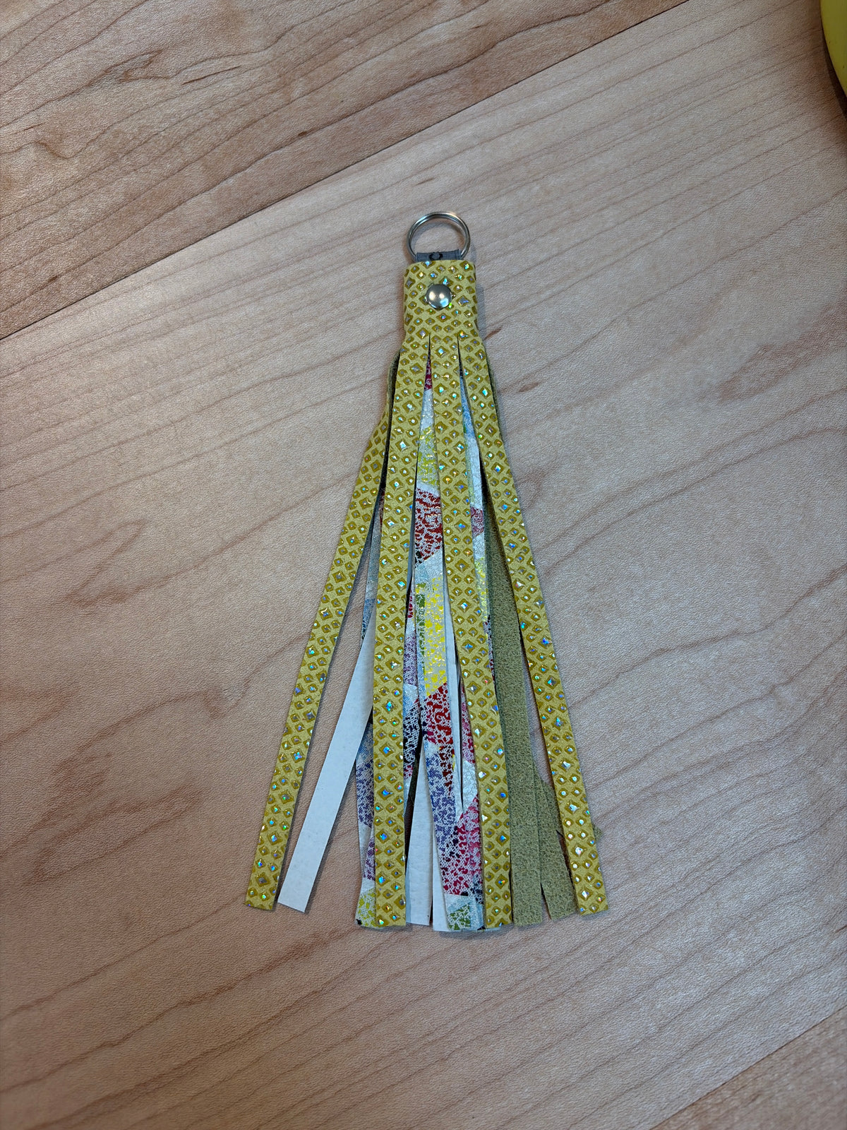 Carmine Tassle Charm